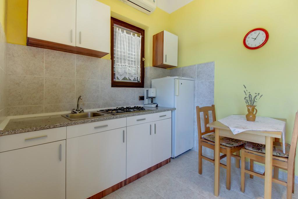 Apartments Villa Julija Mali Lošinj Стая снимка